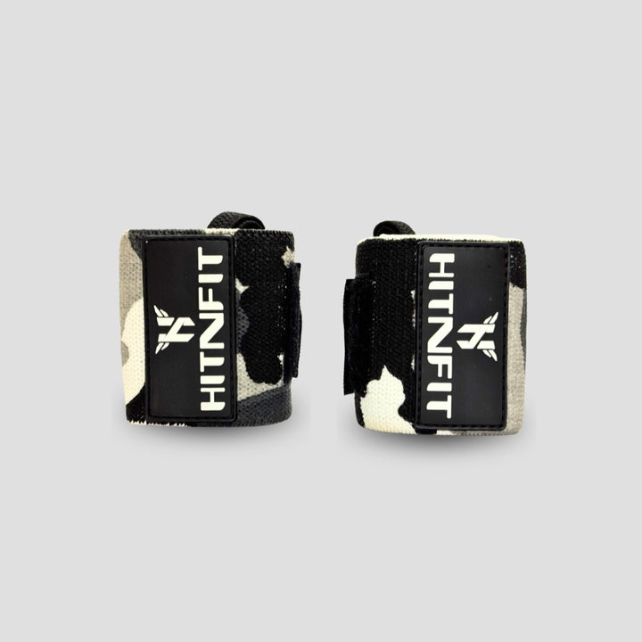 HIT N FIT black and beige camouflage weightlifting wrist wraps with branded patches and adjustable fastening.