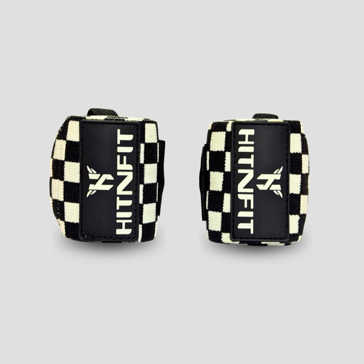 HIT N FIT black and white checkered weightlifting wrist wraps with branded patches and adjustable fastening.