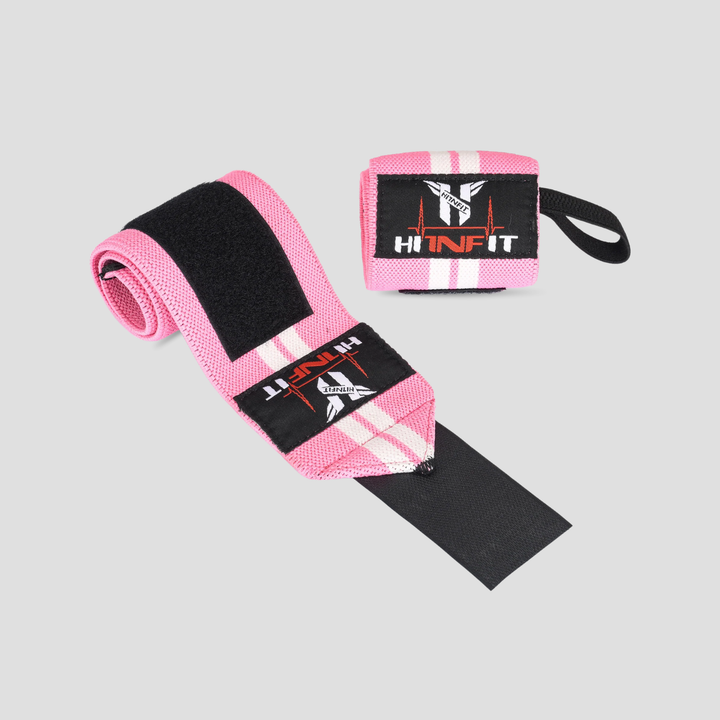HIT N FIT pink and white weightlifting wrist wraps with black fastening, thumb loops and branded patches.