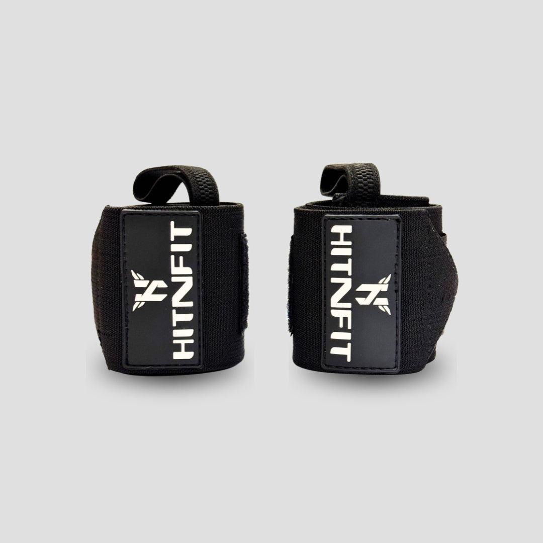 HIT N FIT black weightlifting wrist wraps with thumb loops and branded patches.